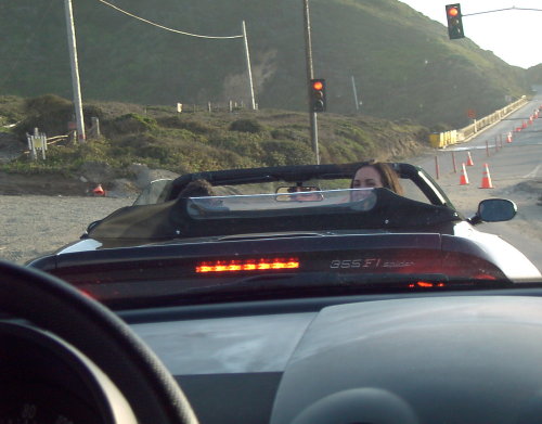 girl riding shotgun in ferrari